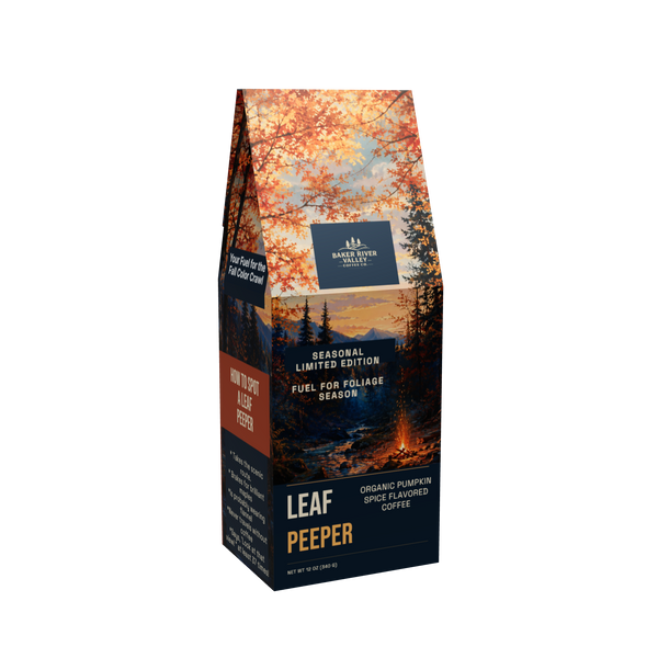 Leaf Peeper organic pumpkin spice flavored coffee bag with autumn forest and mountain scene